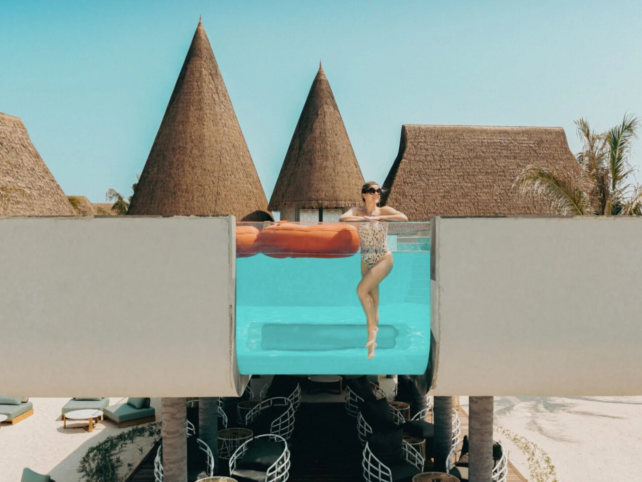 An adults-only sanctuary featuring a glass-bottom infinity pool and sunken seating – exuding another level of calm and exclusivity as the sun sets.