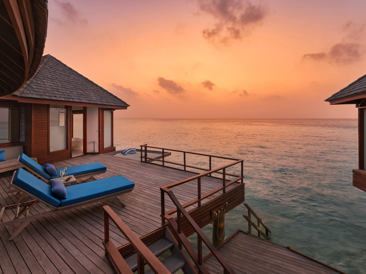 Sunset Over Water Villa