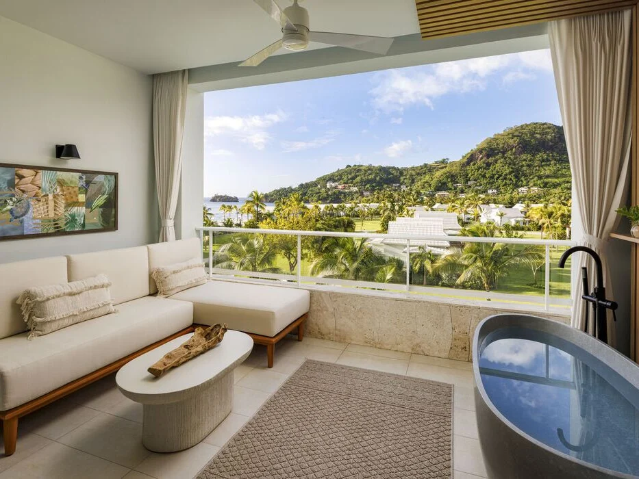 Lady Palm Partial Oceanview Club Suite with Media Room and Balcony Tranquility Soaking Tub